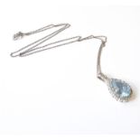 A 9-carat white-gold aquamarine and diamond necklace (matches Lot 202), (full length of the chain