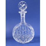 A fine quality cut-glass decanter; banjo-shaped and with target stopper, Dornberger London label (