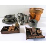 A varied selection of early metalware to include pewter plates, tankards, a two-handled porringer/