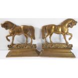 An opposing pair of heavy solid brass doorstops modelled as horses, probably early 20th century (