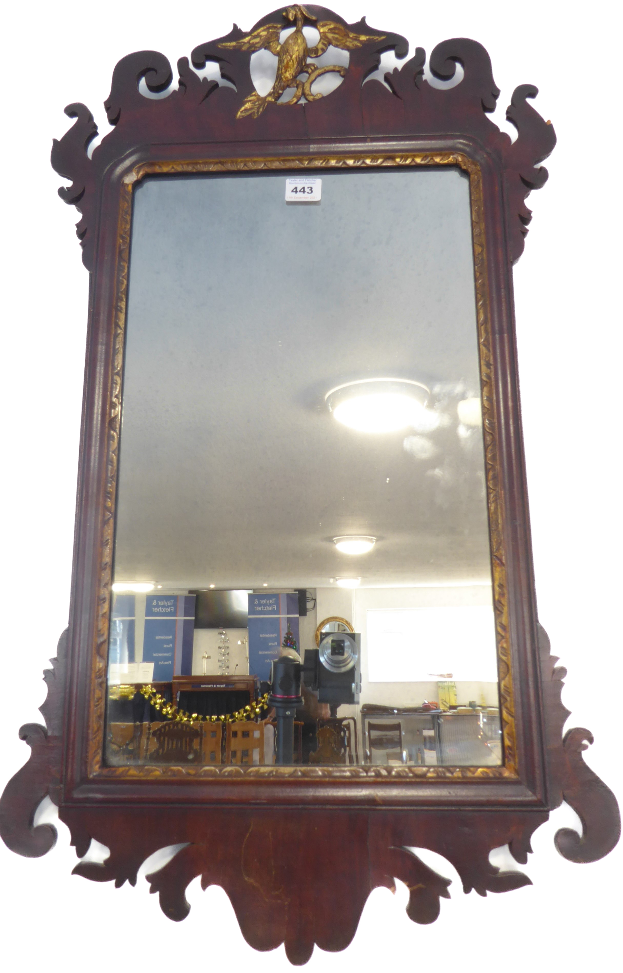 A George III 18th century mahogany and parcel-gilt wall-hanging looking glass; the pierced - Image 2 of 2