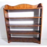 An set of open bookshelves – oak and walnut-faced, three-quartered galleried back (112cm wide x 25.