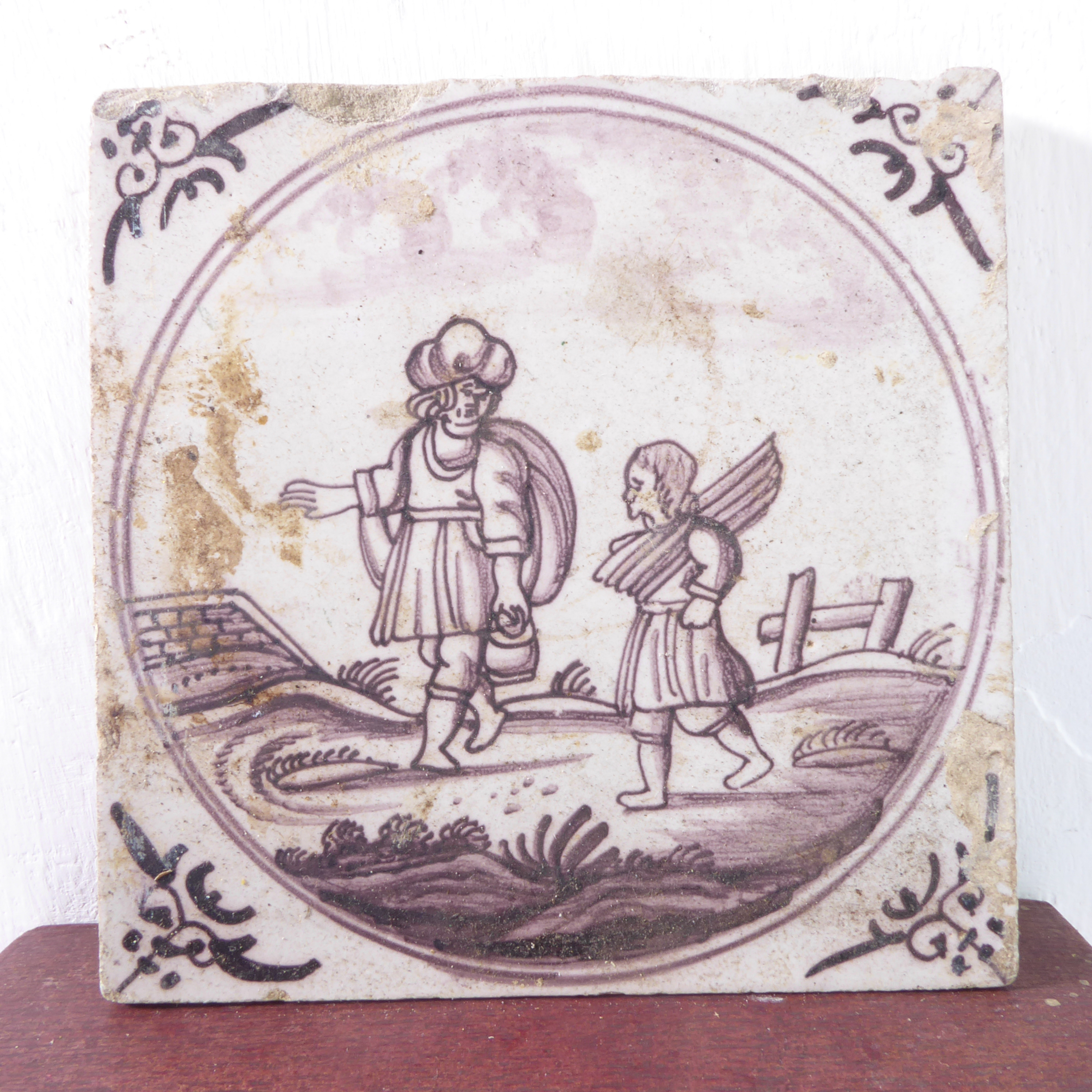 Thirteen early puce-coloured Delftware tiles (probably 18th century) with unusual depictions to - Image 15 of 15