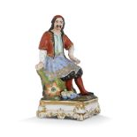 FLACON-STATUETTE DANS LE GOÛT DE JACOB-PETIT en porcelaine polychrome et dorée représentant un