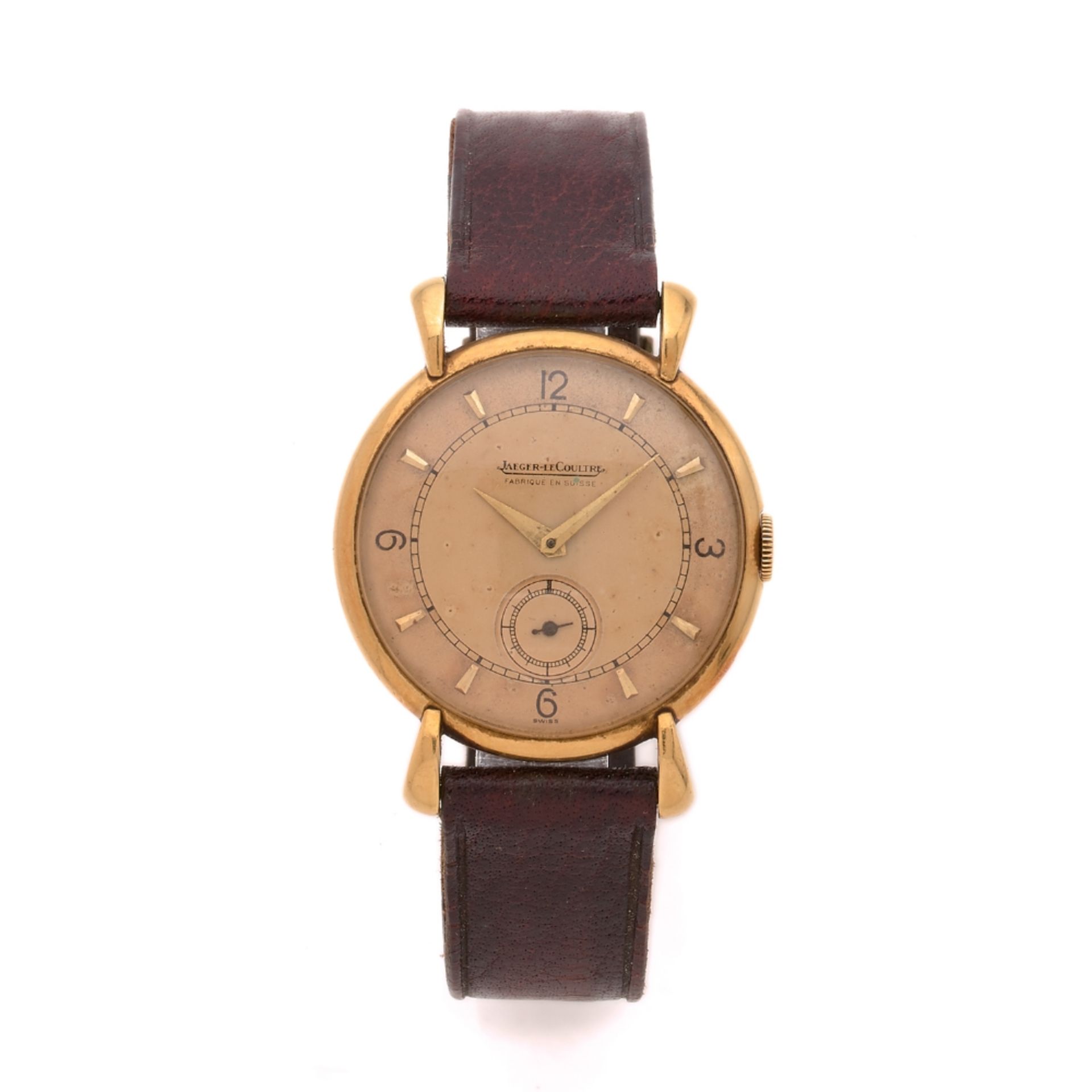 JAEGER LE COULTRE ANNEES 40 Montre bracelet en or jaune sur cuir. BOITIER : rond avec anses