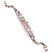 MOVADO ANNEES 20 Elégante petite montre bracelet de dame en platine, or gris et diamants.