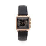 BAUME & MERCIER CHRONOGRAPHE ANNEES 40 Montre bracelet en or rose sur cuir avec chronographe.