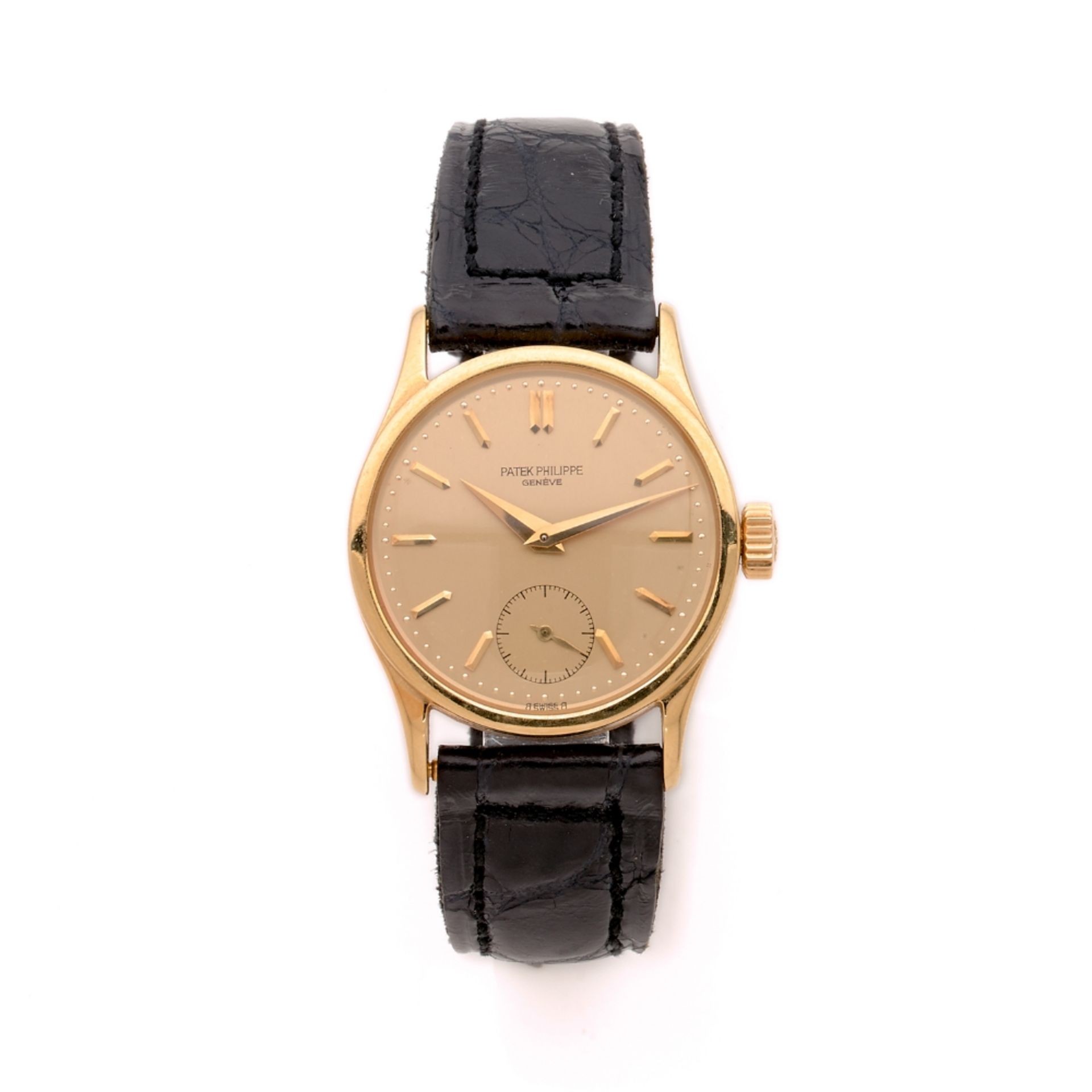 PATEK PHILIPPE CALATRAVA. REF. 96. VENDUE LE 28 MAI 1957 Montre bracelet en or jaune sur cuir.