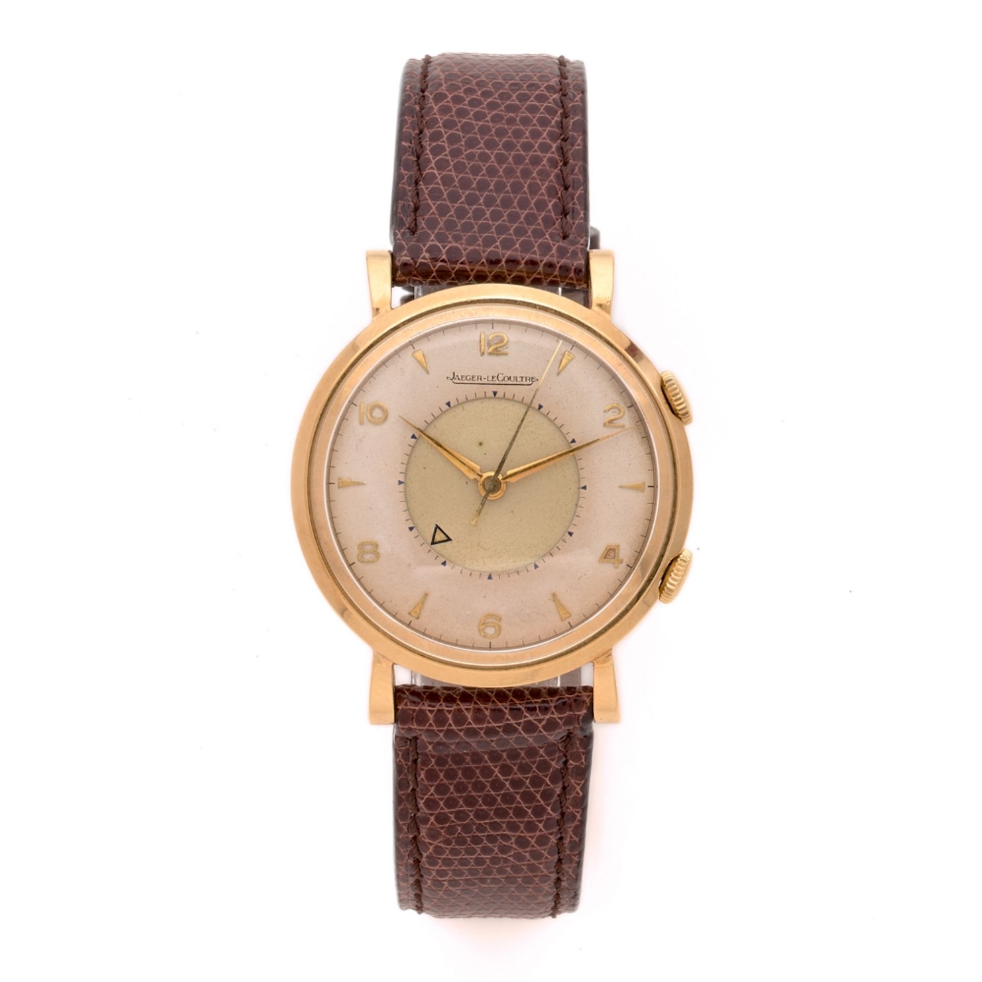 JAEGER LE COULTRE ANNEES 50 Montre bracelet en or jaune avec avec fonction réveil. BOITIER : rond