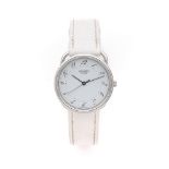 HERMES ARCEAU PM Montre bracelet en acier sur cuir. BOÎTIER : rond avec attache au sommet.