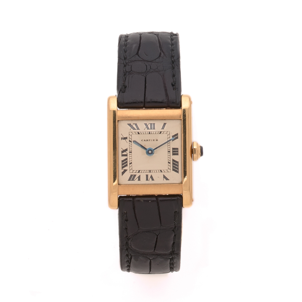 CARTIER TANK Montre bracelet en or jaune sur cuir. BOITIER : rectangulaire. Poinçon EJ (Edmond