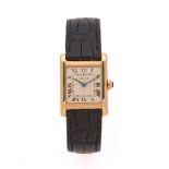 CARTIER TANK Montre bracelet en or jaune sur cuir. BOITIER : rectangulaire. Poinçon EJ (Edmond