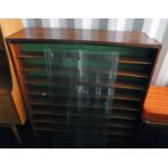 PAIR OF LATE 20TH CENTURY TEAK DISPLAY SHELF UNITS Condition Report: Both have age