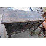 19TH CENTURY OAK COFFER WITH CARVED PANEL FRONT 128 CM LONG