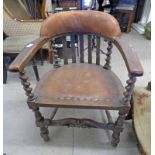 EARLY 20TH CENTURY OAK & LEATHER ELBOW CHAIR WITH BARLEY TWIST SUPPORTS 82 CM TALL