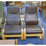 PAIR BEECH & LEATHER ARMCHAIRS ON SHAPED SUPPORTS Condition Report: Generally in