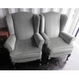 PAIR OF WINGBACK ARMCHAIRS ON QUEEN ANNE SUPPORTS Condition Report: Both chairs are