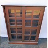 STAINED MAHOGANY BOOK SHELF WITH 2 SLIDING GLASS PANEL DOORS