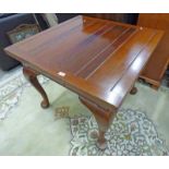 MAHOGANY PULL-OUT DINING TABLE WITH 2 LEAVES ON SHAPED SUPPORTS MAX.