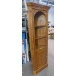 PINE CORNER CUPBOARD WITH SHELVED AREA OVER PANEL DOOR