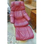 RED LEATHER RECLINING ARMCHAIR & FOOTSTOOL