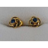 PAIR OF SAPPHIRE SET EARRINGS IN UNMARKED YELLOW METAL MOUNTS Condition Report: They
