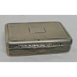 SILVER SNUFF BOX WITH REEDED DECORATION AND FLORAL THUMB PIECE