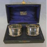 CASED PAIR OF SILVER NAPKIN RINGS,