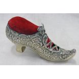 NOVELTY SILVER SHOE PIN CUSHION, BIRMINGHAM 1902, MAKERS MARK H.M. - 12CM LONG.