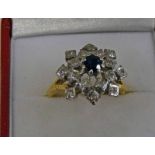 18CT GOLD SAPPHIRE & DIAMOND CLUSTER RING Condition Report: Ring size: Q 1/2,