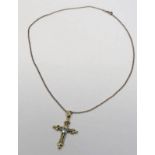 14K GOLD CROSS PENDANT WITH OVAL FACETED STONE INSET ON A 14K GOLD CHAIN - 6.