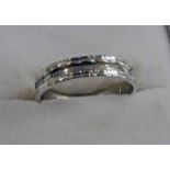 18CT WHITE GOLD WEDDING BAND WITH RAISED BANDING - 2.