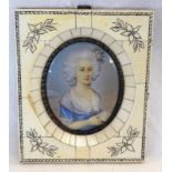 19TH CENTURY FRAMED PORTRAIT MINIATURE OF A LADY IN A BLUE DRESS READING - 8.2 X 6.