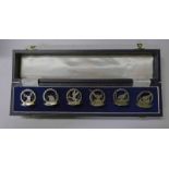 CASED SET OF 6 HUNTING THEMED SILVER PLACE MARKERS,