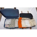 SUITCASES WITH VARIOUS MATERIALS INCLUDING TABLE CLOTHS,