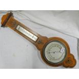 EARLY 20TH CENTURY WALNUT ANERIOD BAROMETER Condition Report: Current reading is