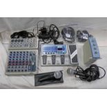 PEAVEY PV8 MIXER, BOSS ME-20 GUITAR MULTIPLE EFFECTS AND TWO MICROPHONES IN ONE BOX.