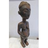 MENDE STANDING FEMALE FIGURE WEARING LOIN CLOTH,