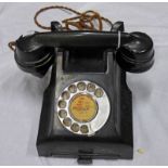 BLACK ROTARY TELEPHONE WITH A WEMBLEY 0915 NUMBER DISC