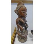 CONGO SEATED FEMALE FERTILITY FIGURE BASED A TOP A BUFFALO,