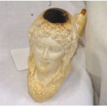 19TH CENTURY CARVED IVORY MEERSCHAUM PIPE CARVED IN THE FORM OF A ELEGANT LADY WITH CURLY HAIR AND
