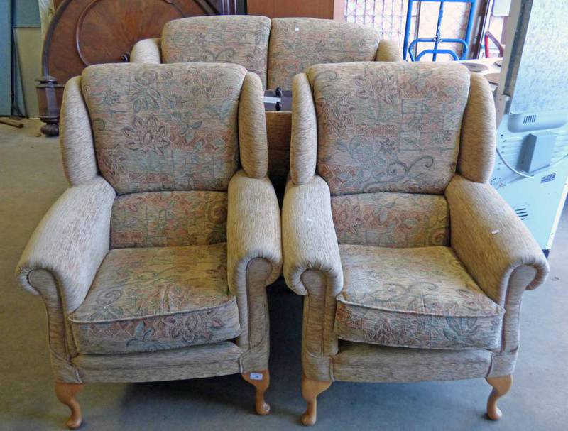 PAIR OF OVERSTUFFED ARMCHAIRS ON SHAPED SUPPORTS,