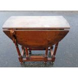 OAK DROP LEAF SUTHERLAND TABLE ON TURNED SUPPORTS Condition Report: 26cm wide when