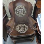 EARLY 20TH CENTURY WINGBACK ARMCHAIR ON QUEEN ANNE SUPPORTS