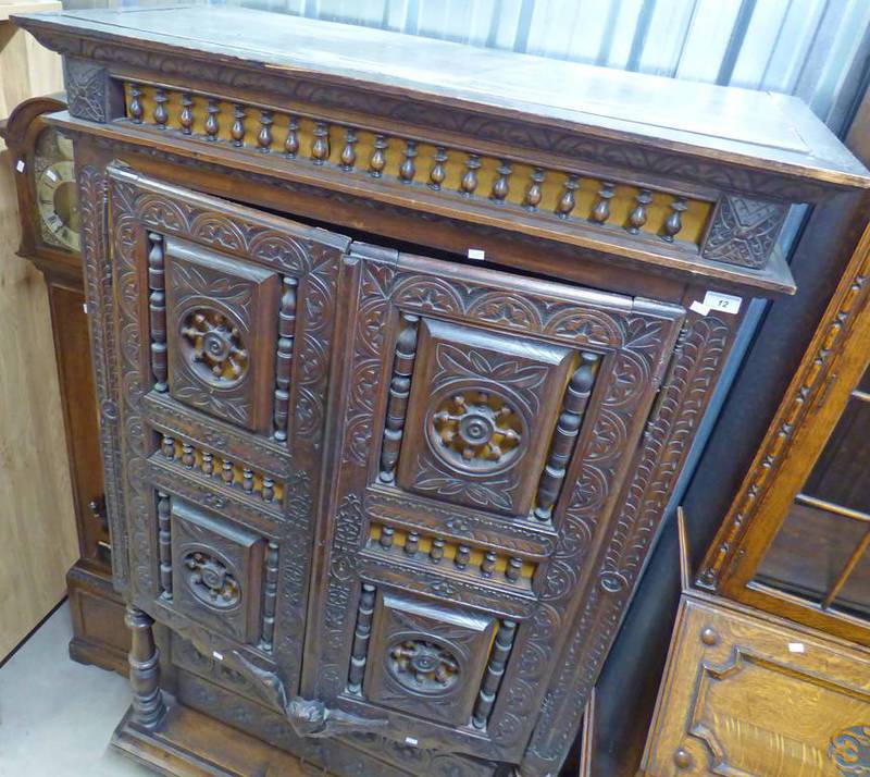 19TH CENTURY CARVED OAK CABINET WITH 2 CARVED PANEL DOORS OVER 2 DRAWERS 180CM TALL X 105CM WIDE