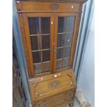 EARLY 20TH CENTURY OAK BUREAU BOOKCASE WITH 2 GLAZED DOORS OVER FALL FRONT ON TURNED SUPPORTS 202CM