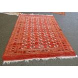 RED GROUND EASTERN CARPET - 230 X 278 CMS Condition Report: Two holes present.