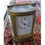 OVAL CASED BRASS CARRIAGE CLOCK