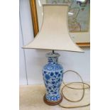 CHINESE BLUE & WHITE PORCELAIN TABLE LAMP ON A HARDWOOD BASE Condition Report: Base