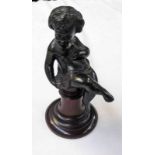 EARLY 20TH CENTURY BRONZED METAL FIGURE OF A BOY ON A MAHOGANY BASE - 14.